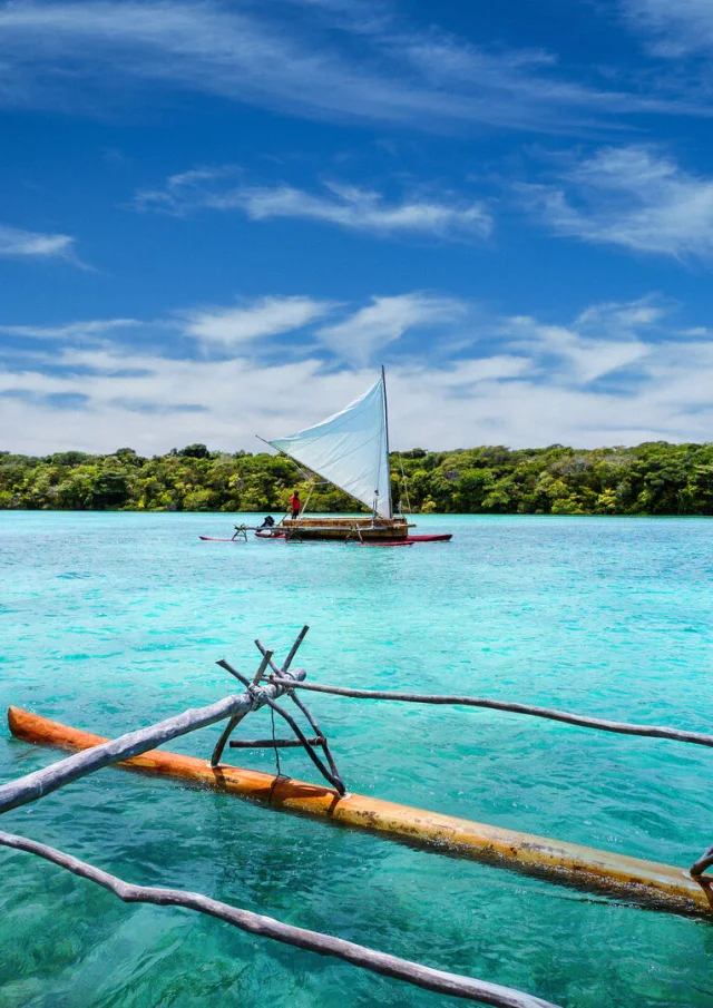 Traditional pirogue on Upi Bay