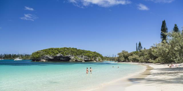 View of Kanumera Bay, its beach and rock on Île des Pins, New Caledonia.