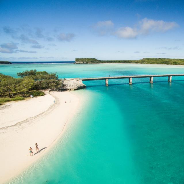 Aerial view of Mouli beach and bridge at Ouvéa, Loyalty Islands, New Caledonia.