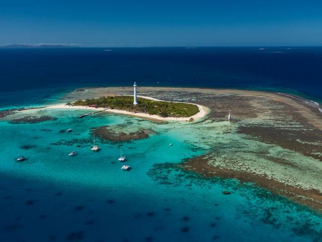 Nouméa's Amédée islet and its lighthouse as seen from a helicopter flight.