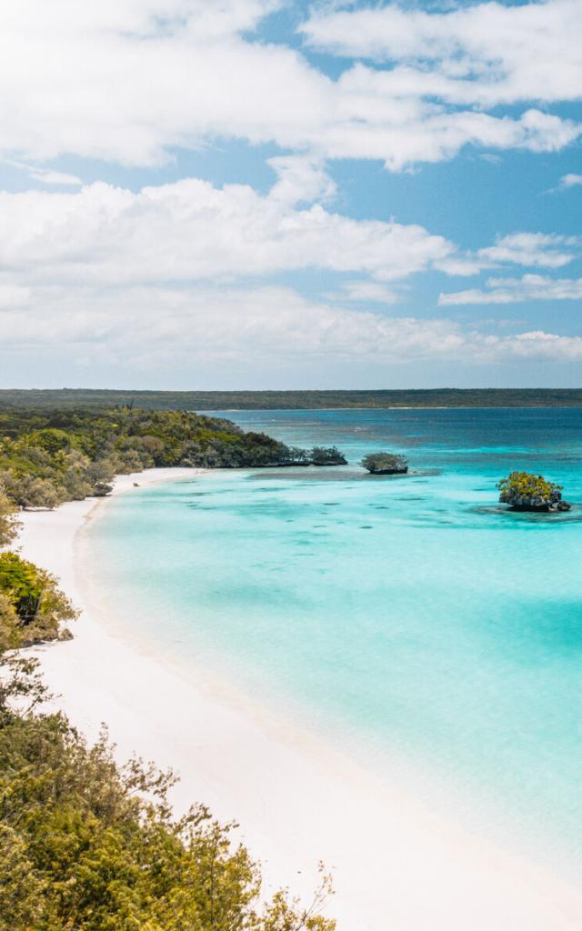 Aerial view of Luengoni beach and the lagoon at Mu, Lifou, Loyalty Islands, New Caledonia.