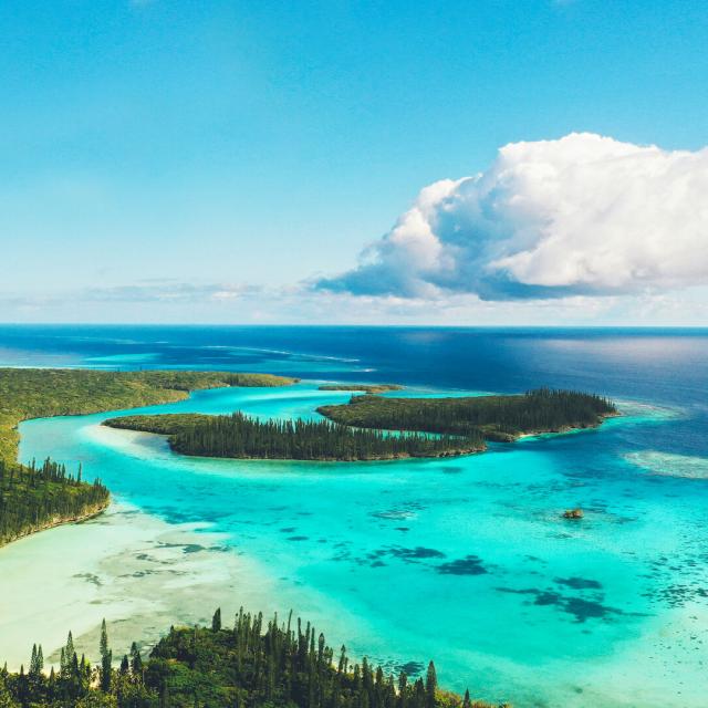 Aerial view of Baie d'Oro and the Mwâréya and Kônubutr islands on Île des Pins, New Caledonia.