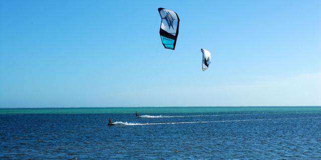 Kitesurfing on Poé lagoon in Bourail, New Caledonia.