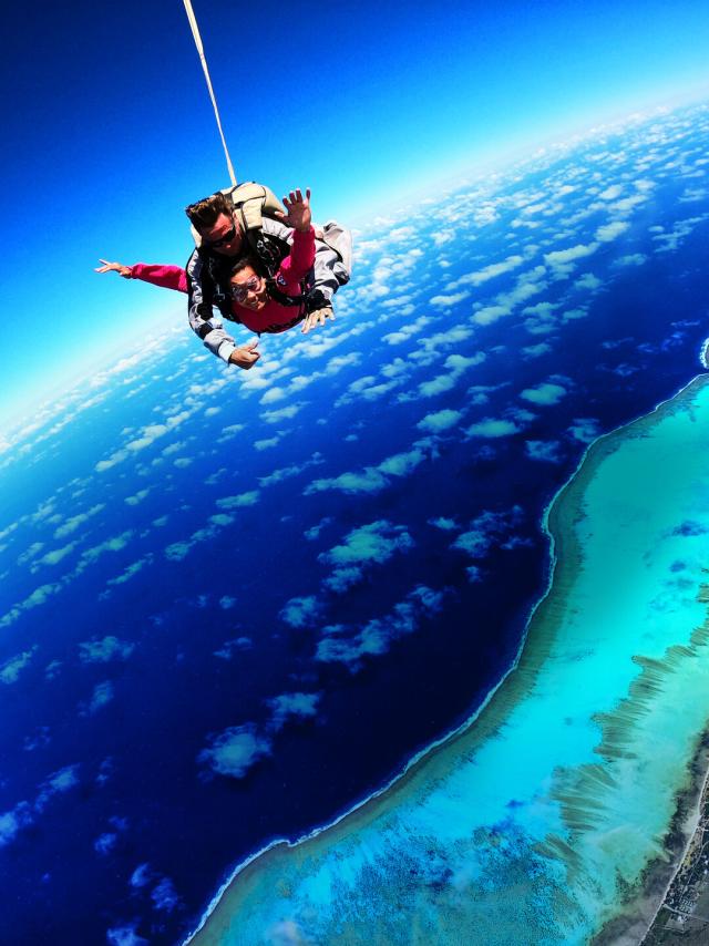Skydiving over Poé lagoon in Bourail, New Caledonia.