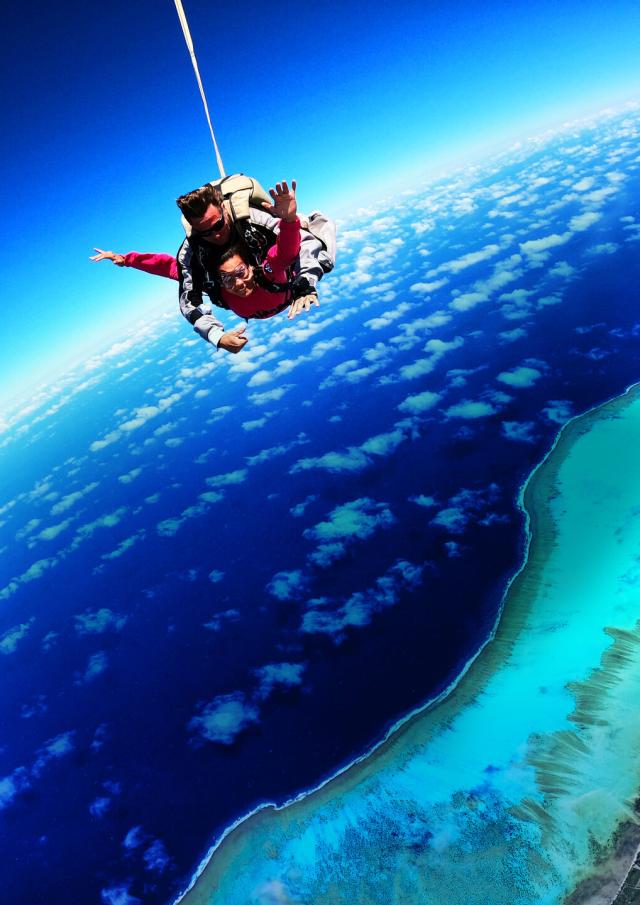 Skydiving over Poé lagoon in Bourail, New Caledonia.
