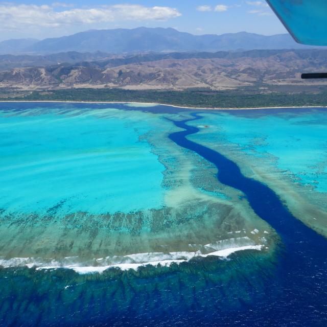 Microlight flight over the lagoon and the shark fault in Bourail, New Caledonia.