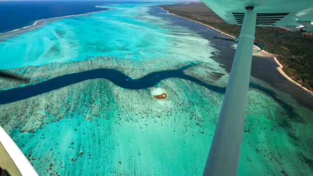 Microlight flight over the lagoon and the shark fault in Bourail, New Caledonia.