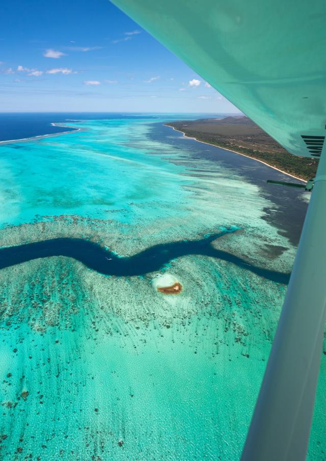 Microlight flight over the lagoon and the shark fault in Bourail, New Caledonia.