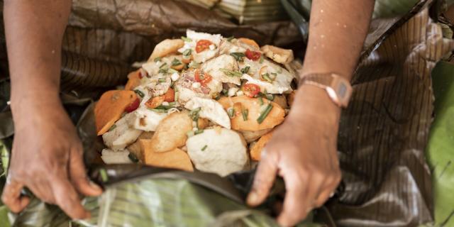 Preparing bougna, a traditional Kanak dish, in Lifou.