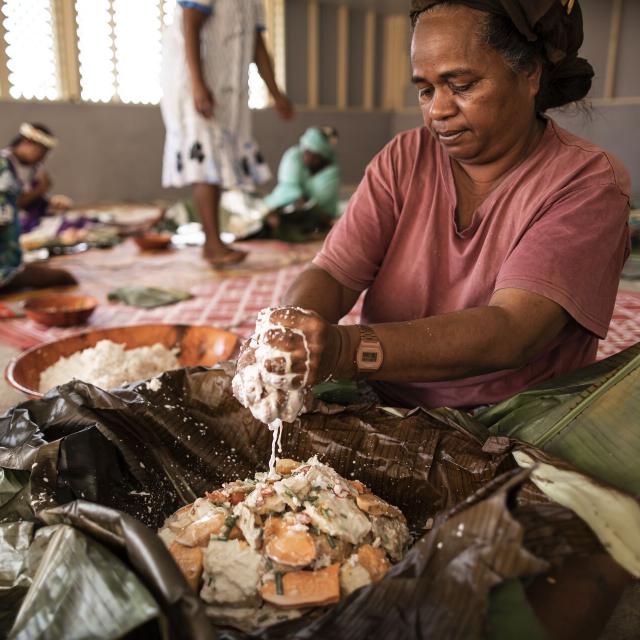 Preparing bougna, a traditional Kanak dish, in Lifou.