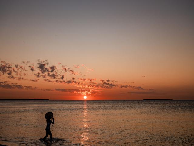 Sunset on the water at Ouvéa