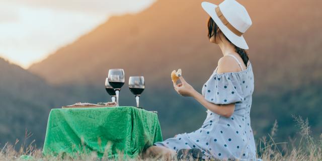 Glass of wine at sunset in New Caledonia