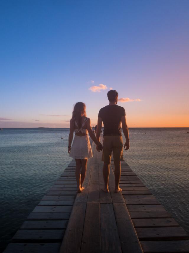 Couple at sunset on the beach, New Caledonia