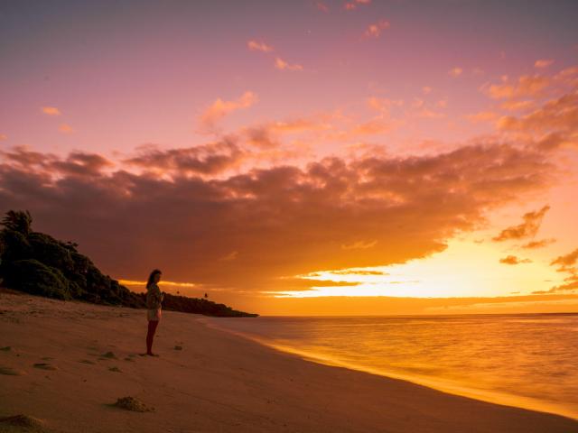 Admire the sunset on a Lifou beach