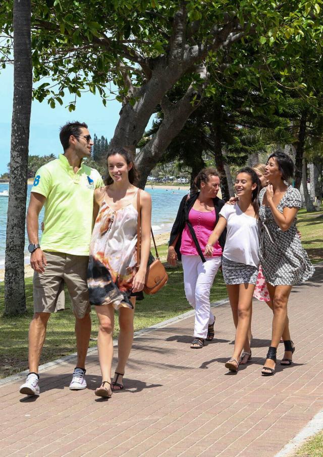 A family stroll along Anse Vata bay