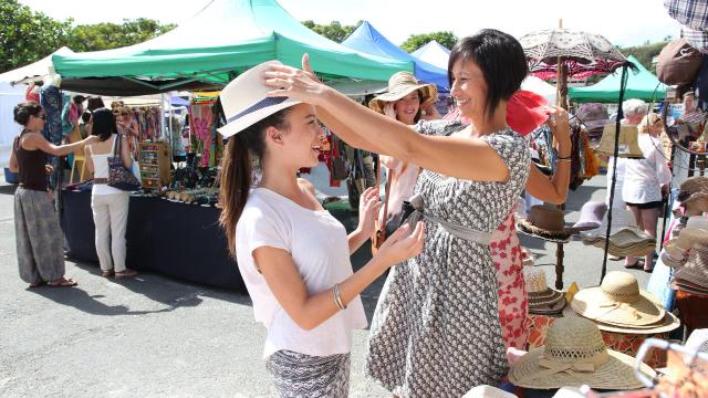 Family shopping at the Nouméa market