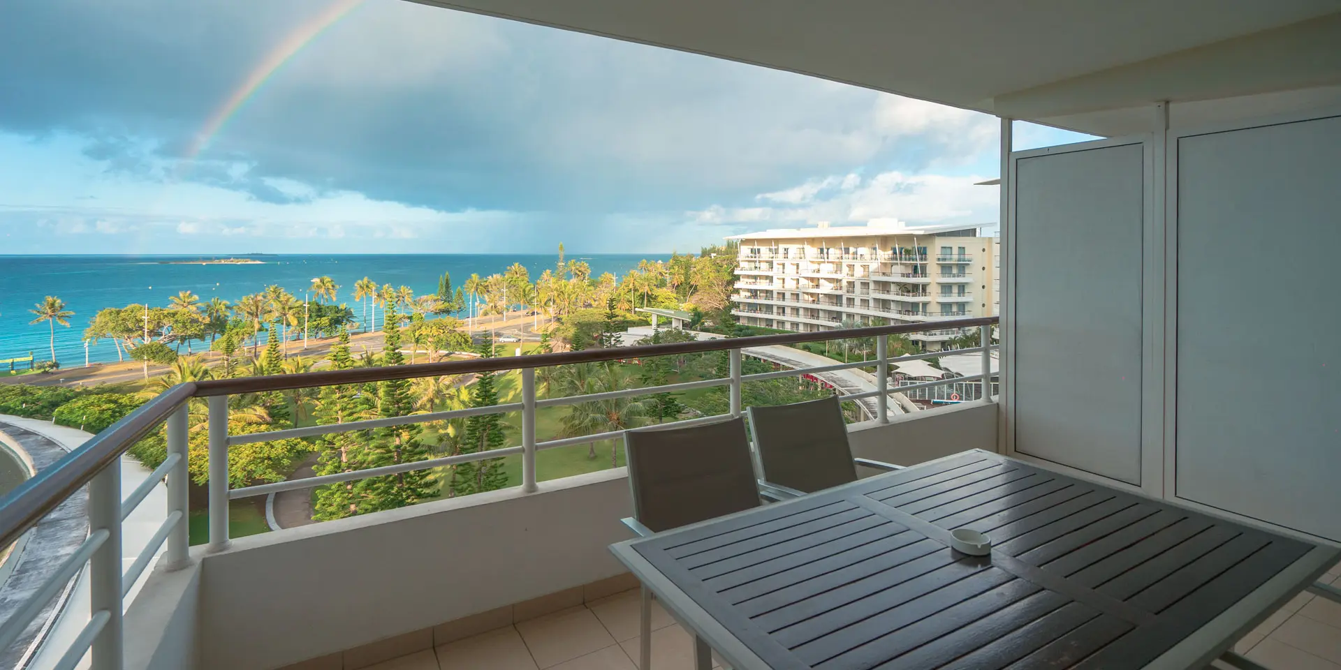 View from a room terrace at Hilton Noumea La Promenade Residences, with Anse Vata Bay in the distance.